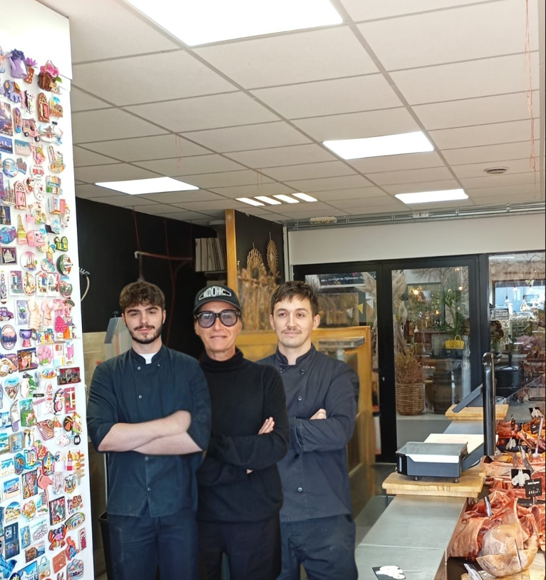 Marie-Pierre et ses deux associés dans la boucherie